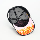 TROUBLE IN PARADISE TRUCKER HAT - BLACK