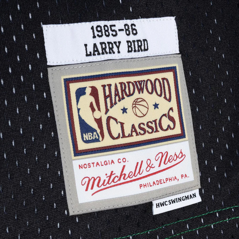 Mitchell & Ness Men's Larry Bird Black, Kelly Green Boston Celtics Hardwood  Classics 1985-86 Split Swingman Jersey